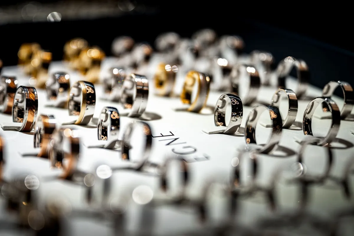 A collection of luxury rings displayed on a counter, reflecting fine craftsmanship and elegance.